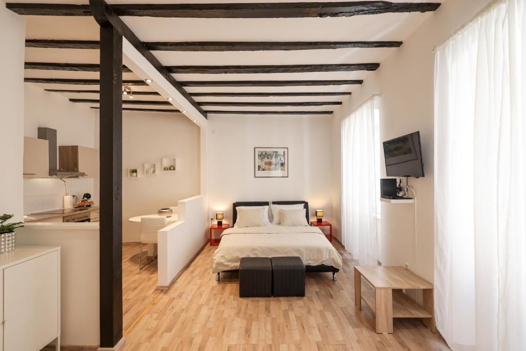 Posteľ alebo postele v izbe v ubytovaní Studio Kalelarga