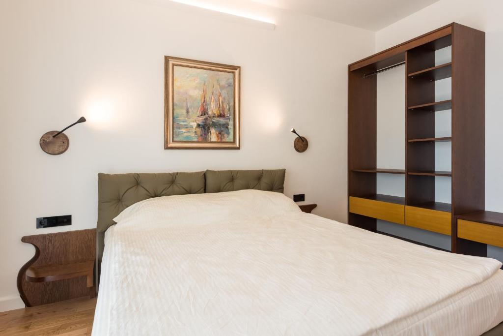 Postel nebo postele na pokoji v ubytování Balkida Residence - Balchik Villas