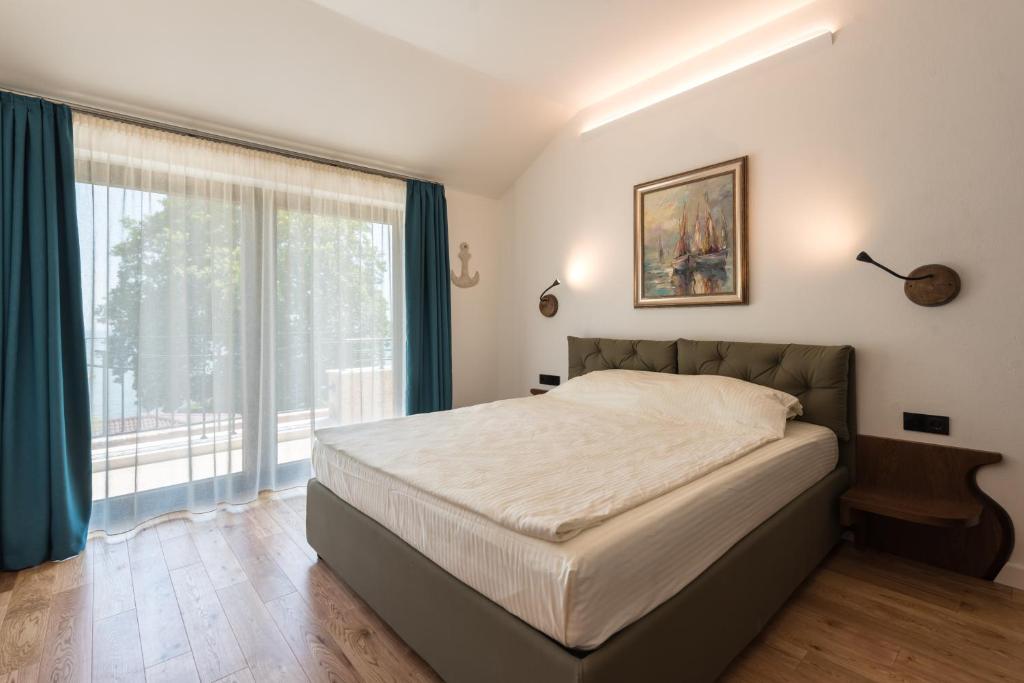 Postel nebo postele na pokoji v ubytování Balkida Residence - Balchik Villas