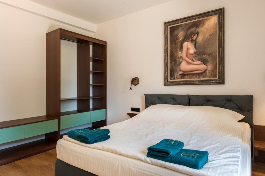 Postel nebo postele na pokoji v ubytování Balkida Residence - Balchik Villas
