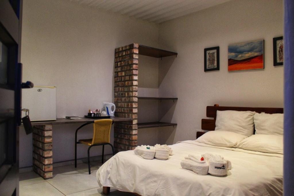 the FARMHOUSE BOUTIQUE GUESTHOUSE AND BEERGARDEN CC - Habitación Gemela De Lujo