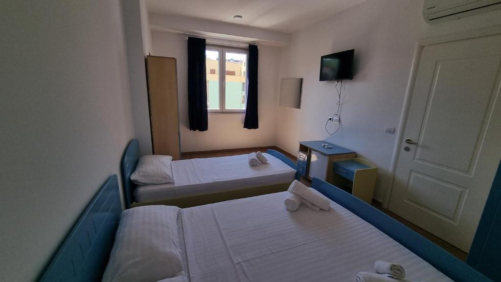 Postel nebo postele na pokoji v ubytování BLUE AMR