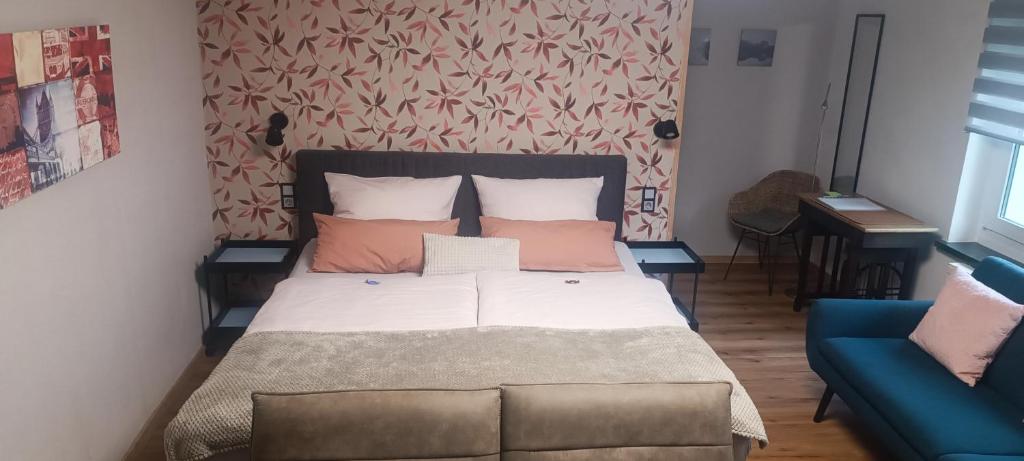 Postel nebo postele na pokoji v ubytování Haus MaRi