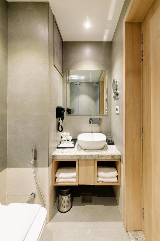 Postel nebo postele na pokoji v ubytování Signature Hotel