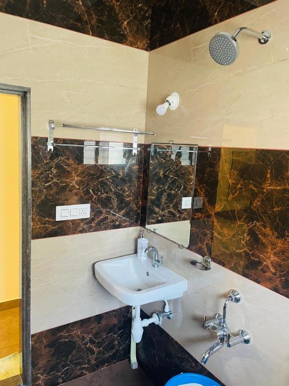 Vannituba majutusasutuses Hotel Ramdev Chikodi