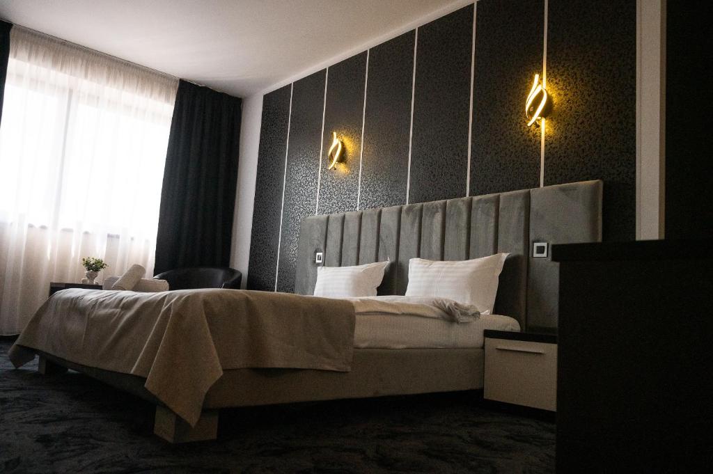 Postel nebo postele na pokoji v ubytování Black Tulip Hotel