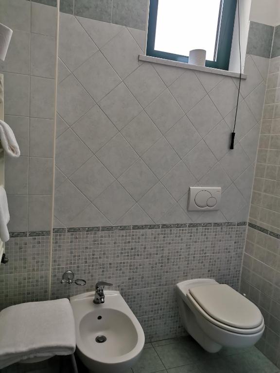 Koupelna v ubytování Hotel Rigolfo