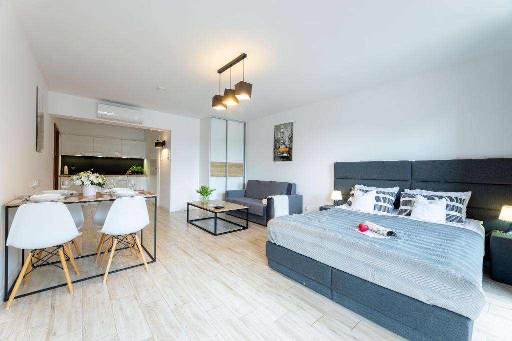 Apartamenty Bałtyckie - Grand Baltic - WIFI, Klimatyzacja, Sala Zabaw, Taras wypoczynkowy, centrum Ustki - Estudio Familiar