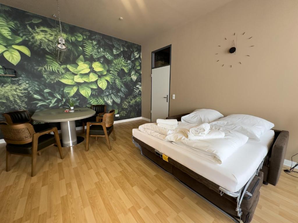 Postel nebo postele na pokoji v ubytování Exklusives Leipzig City Apartment Urban