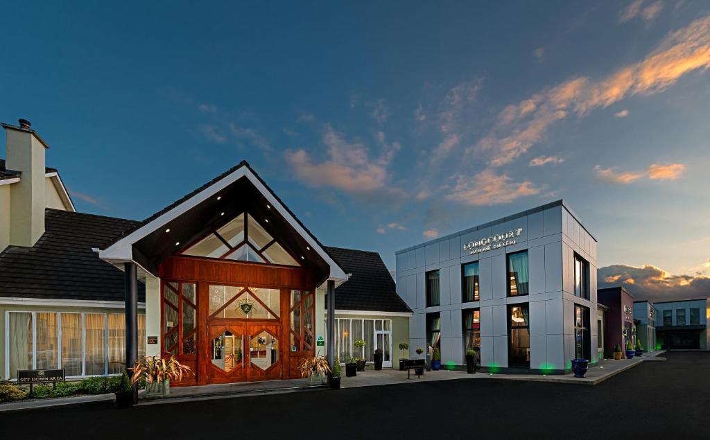 a rendering of a shopping center with a building at Longcourt House Hotel in Newcastle West