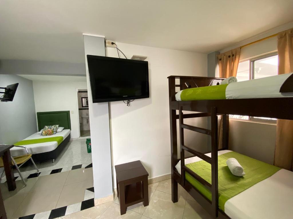 Postel nebo postele na pokoji v ubytování Hotel El Deportista