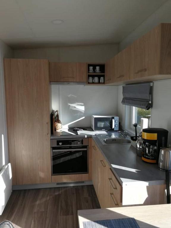 Kuchyň nebo kuchyňský kout v ubytování Tiny House Wemding
