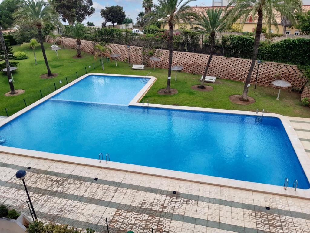 A view of the pool at 2 bedrooms apartement with sea view shared pool and furnished terrace at Calpe 1 km away from the beach or nearby