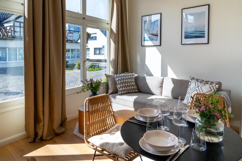 Posezení v ubytování Kapitänshaus Friedrich Franz - Premium Apartments 200 Meter vom Strand und Alten Strom