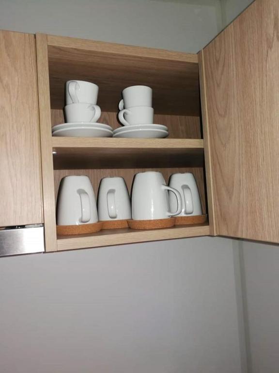 Příslušenství pro přípravu čaje a kávy v ubytování Tiny House Wemding