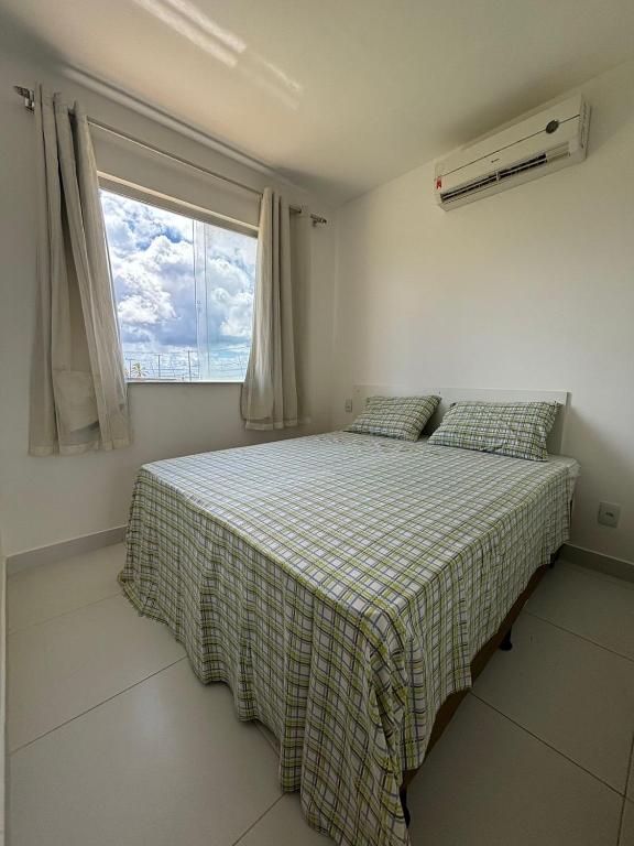 Postel nebo postele na pokoji v ubytování VIRASSOL Praia Hotel