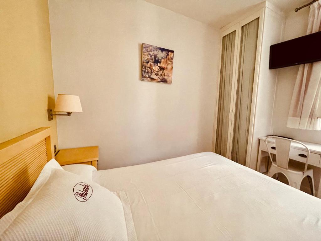 Postel nebo postele na pokoji v ubytování Hotel Palacete