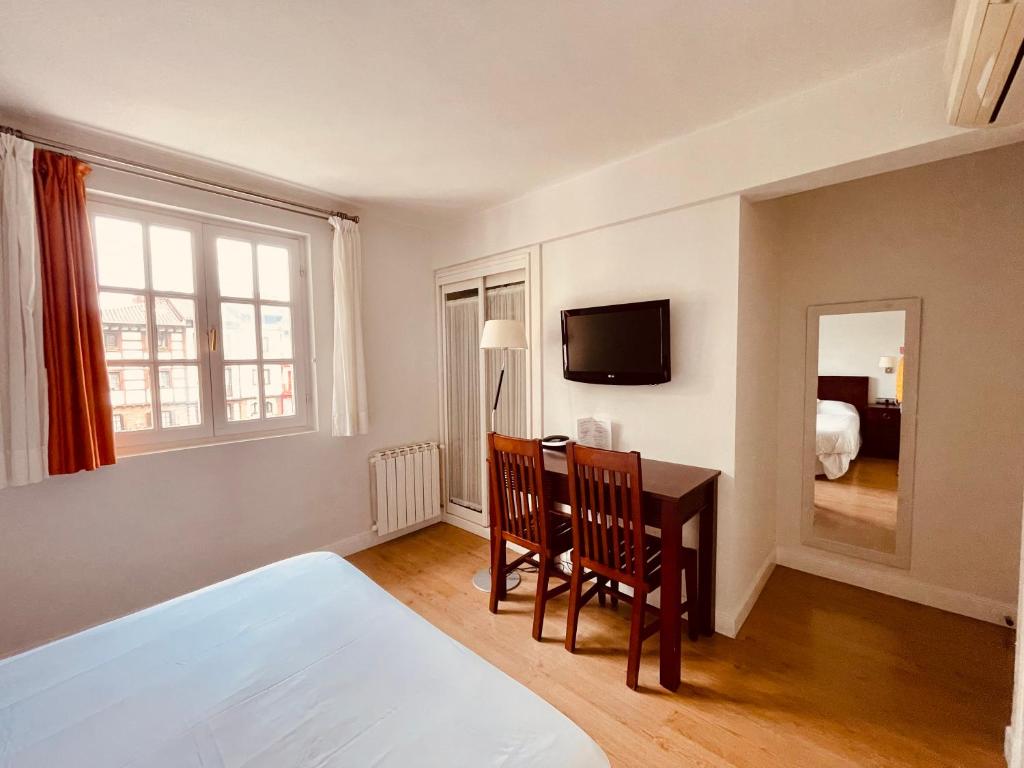 TV a/nebo společenská místnost v ubytování Hotel Palacete