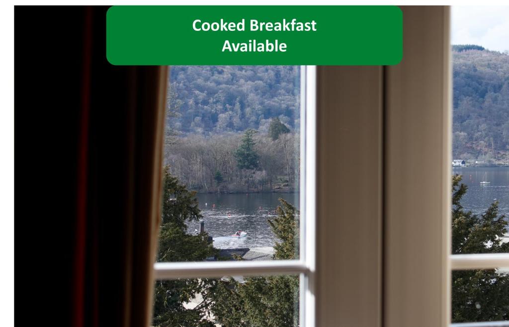 a window with a view of a lake at Bowness Bay Suites in Bowness-on-Windermere
