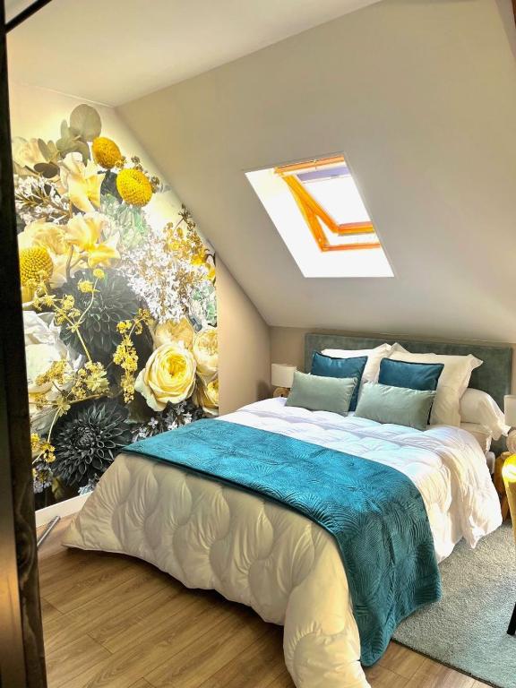 Кровать или кровати в номере Le Clos des Roses