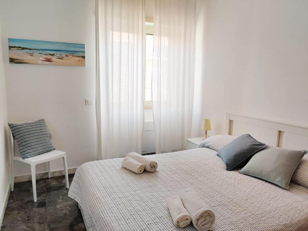 A bed or beds in a room at Casa Atena
