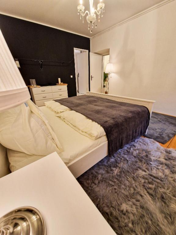 Postel nebo postele na pokoji v ubytování RM Appartements