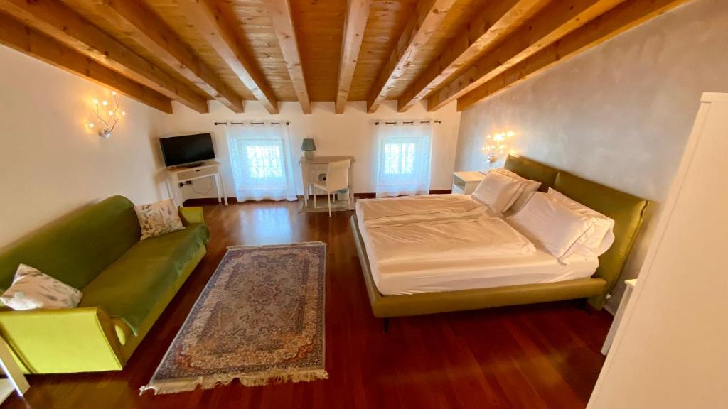 Postel nebo postele na pokoji v ubytování B&B Civico 61