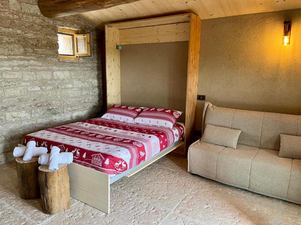 Chalet I Porsili客房内的一张或多张床位