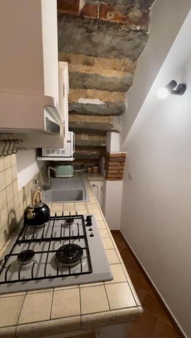 Kuchyň nebo kuchyňský kout v ubytování Casetta Marilà
