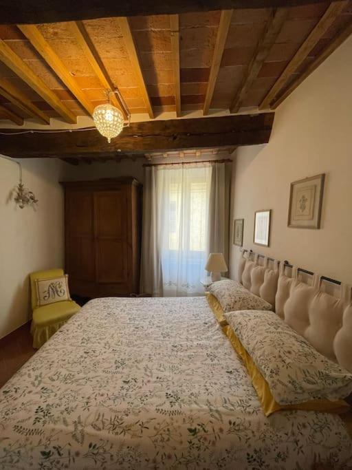 Postel nebo postele na pokoji v ubytování Casetta Marilà