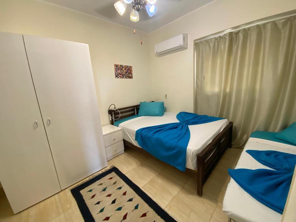 Postel nebo postele na pokoji v ubytování Verona Chalet in Marina Wadi Degla Ain Sokhna - Second Floor