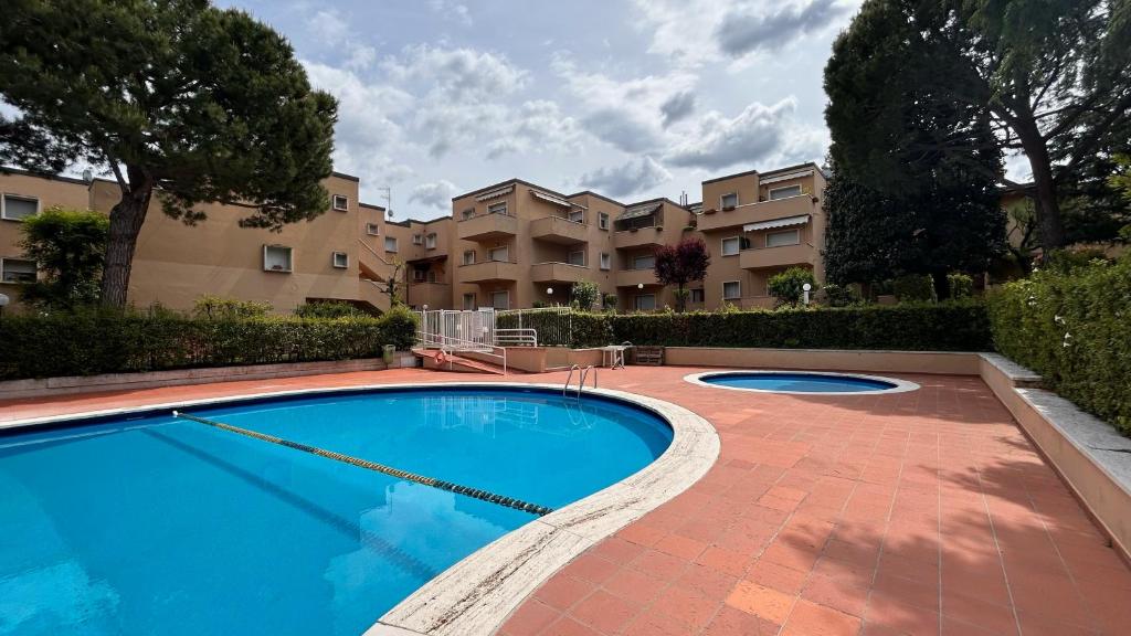 Bazén v ubytování Prestige Garda Home - La Madonnina nebo v jeho okolí