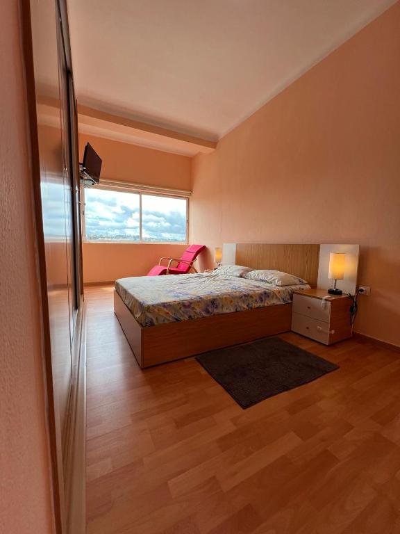 Postel nebo postele na pokoji v ubytování J´S Place