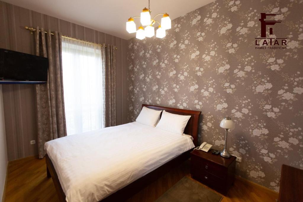 Postel nebo postele na pokoji v ubytování Latar Hotel Yerevan