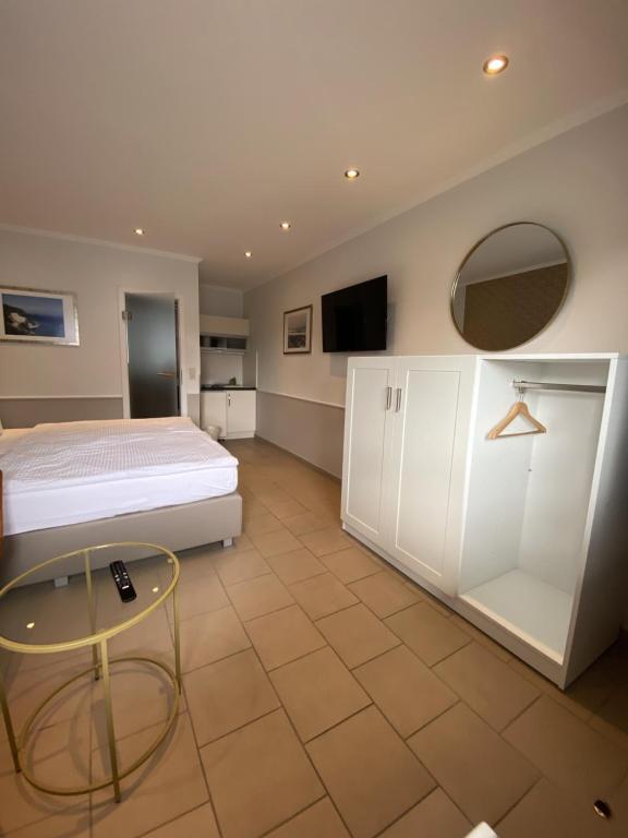 Kuchyň nebo kuchyňský kout v ubytování Hotel zum Hafen