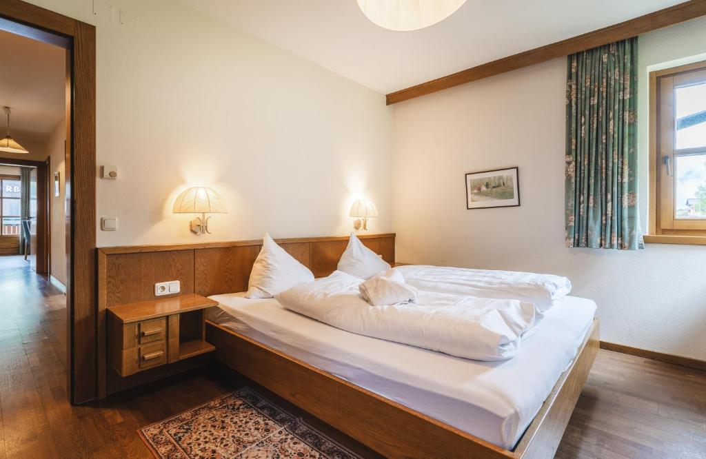 Posteľ alebo postele v izbe v ubytovaní Appartements Pulverer