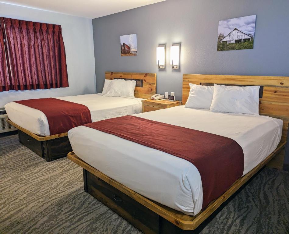 Postel nebo postele na pokoji v ubytování First Gold Gaming Resort