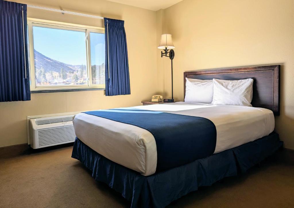 Postel nebo postele na pokoji v ubytování First Gold Gaming Resort
