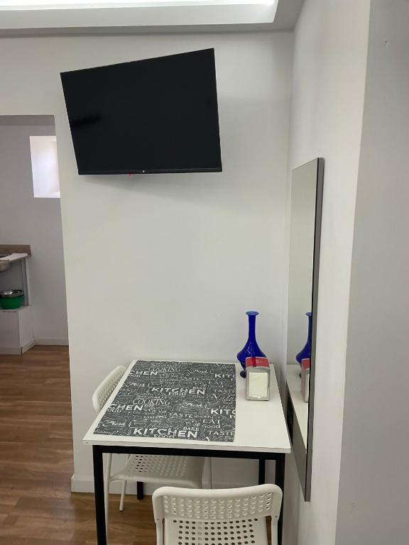 TV a/nebo společenská místnost v ubytování Imaculada Home Royal - Centro de Braga, Historico