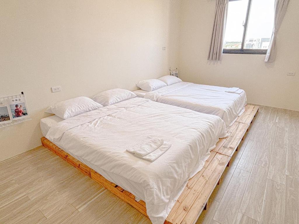 Postel nebo postele na pokoji v ubytování Lunos homestay