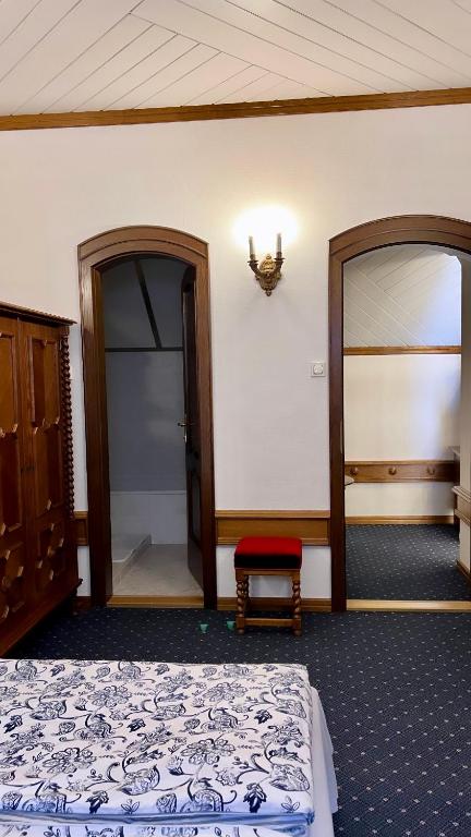 Postel nebo postele na pokoji v ubytování Veszprémvölgyi Kúria