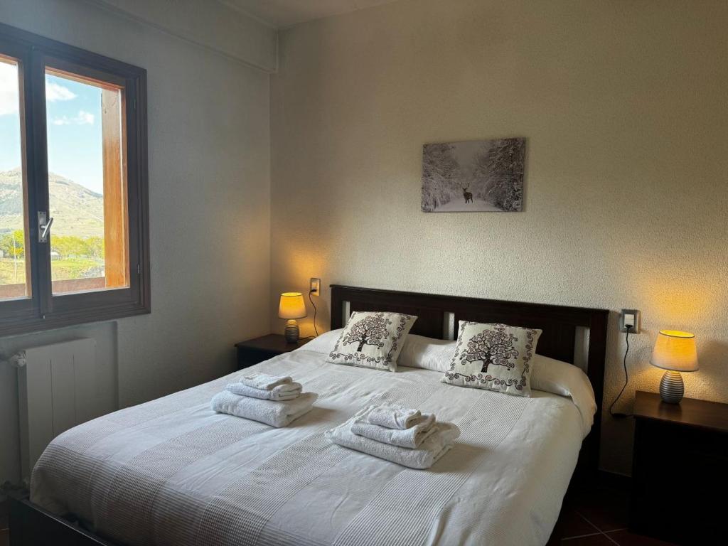 Postel nebo postele na pokoji v ubytování Host Roccaraso