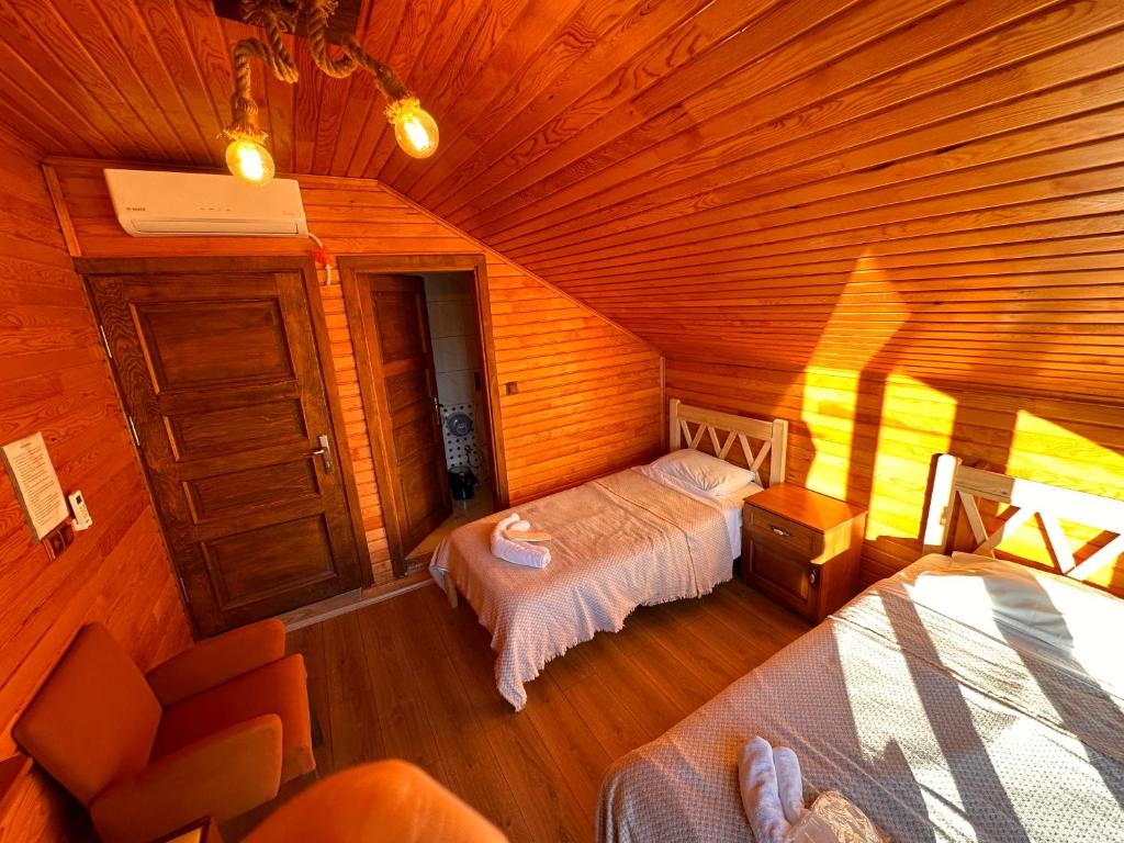 Postel nebo postele na pokoji v ubytování Falez Cafe&Restaurant&Pansiyon-Arhavi