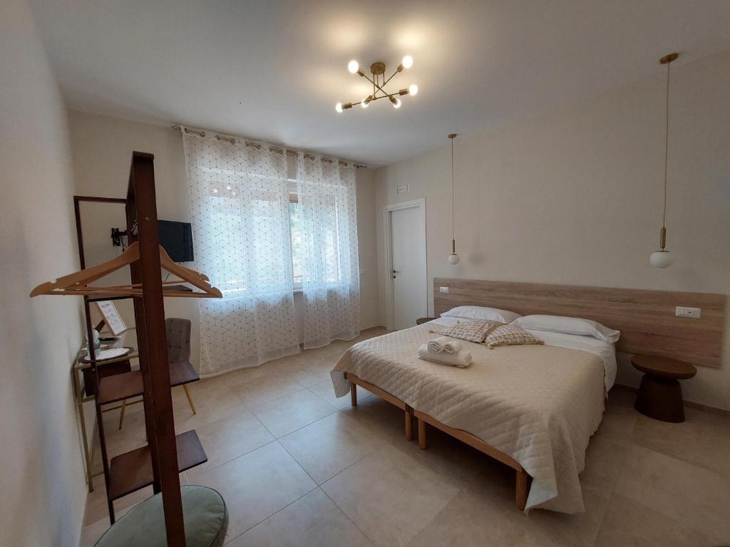 Postel nebo postele na pokoji v ubytování Namuri Comfortable Rooms