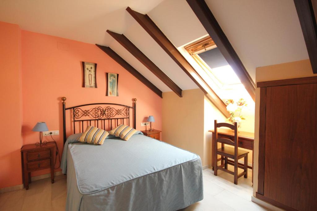 Posteľ alebo postele v izbe v ubytovaní Hostal Niza