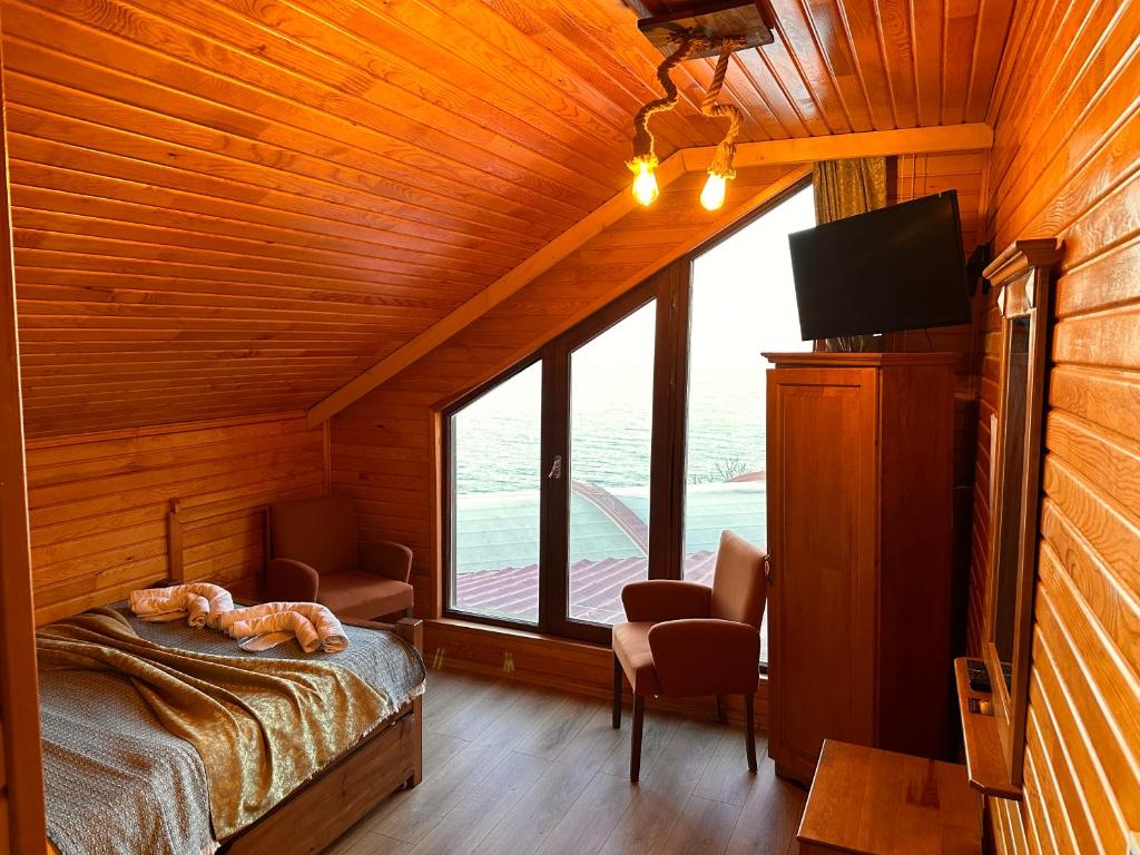 TV a/nebo společenská místnost v ubytování Falez Cafe&Restaurant&Pansiyon-Arhavi