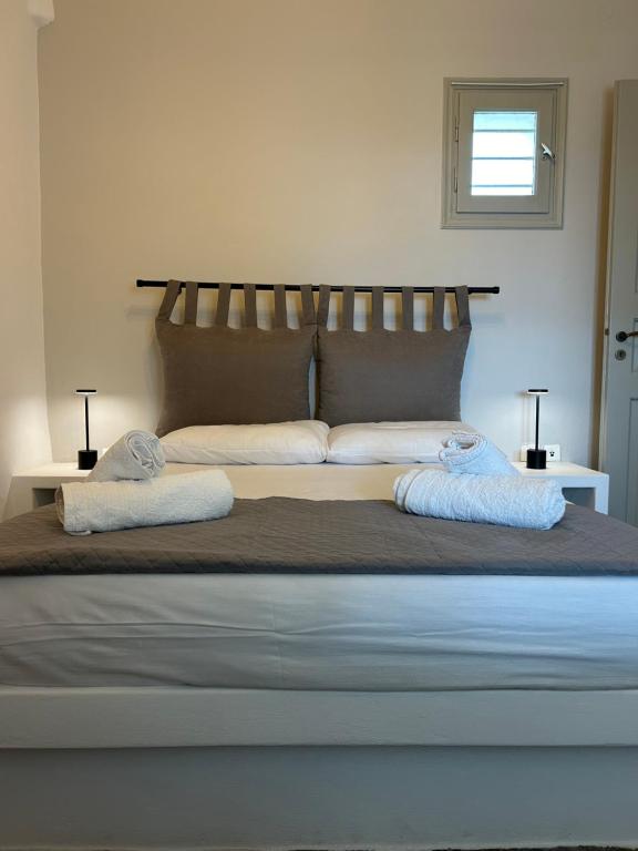 Lithari Traditional Apartment tesisinde bir odada yatak veya yataklar