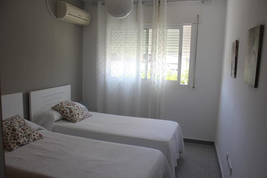 Posteľ alebo postele v izbe v ubytovaní Apartamento en Ciudad Jardin