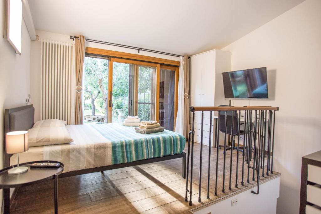 Postel nebo postele na pokoji v ubytování Casa di Marco e Kaila