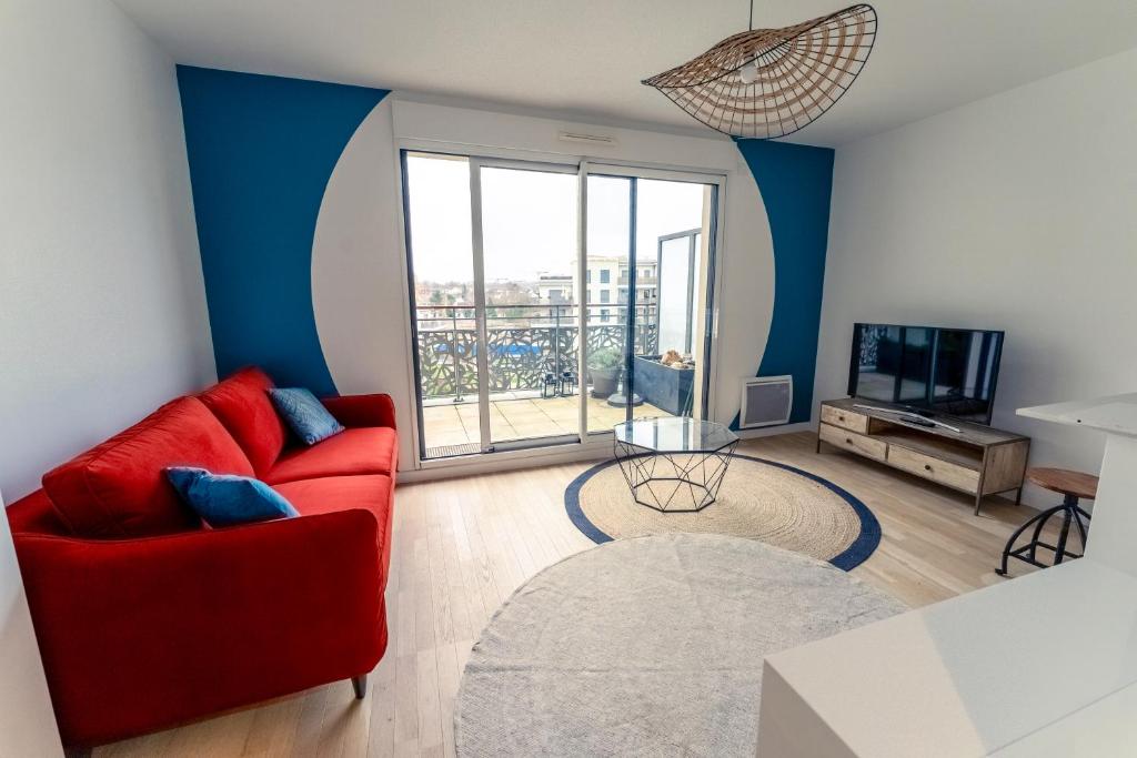 พื้นที่นั่งเล่นของ Appartement résidence neuve proche Versailles